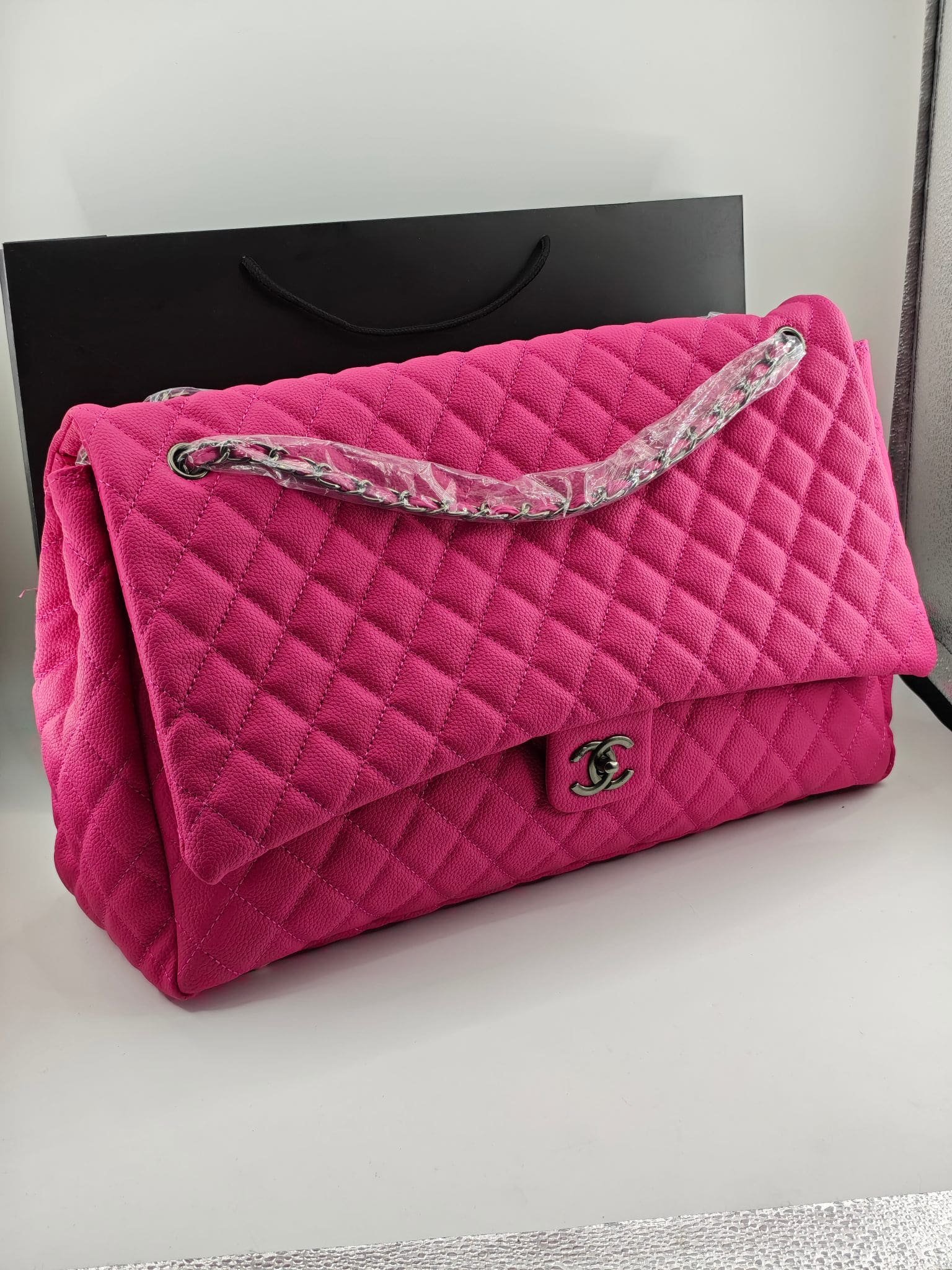 chanel-classic-maxi-flap-bag-in-pink-calfskin